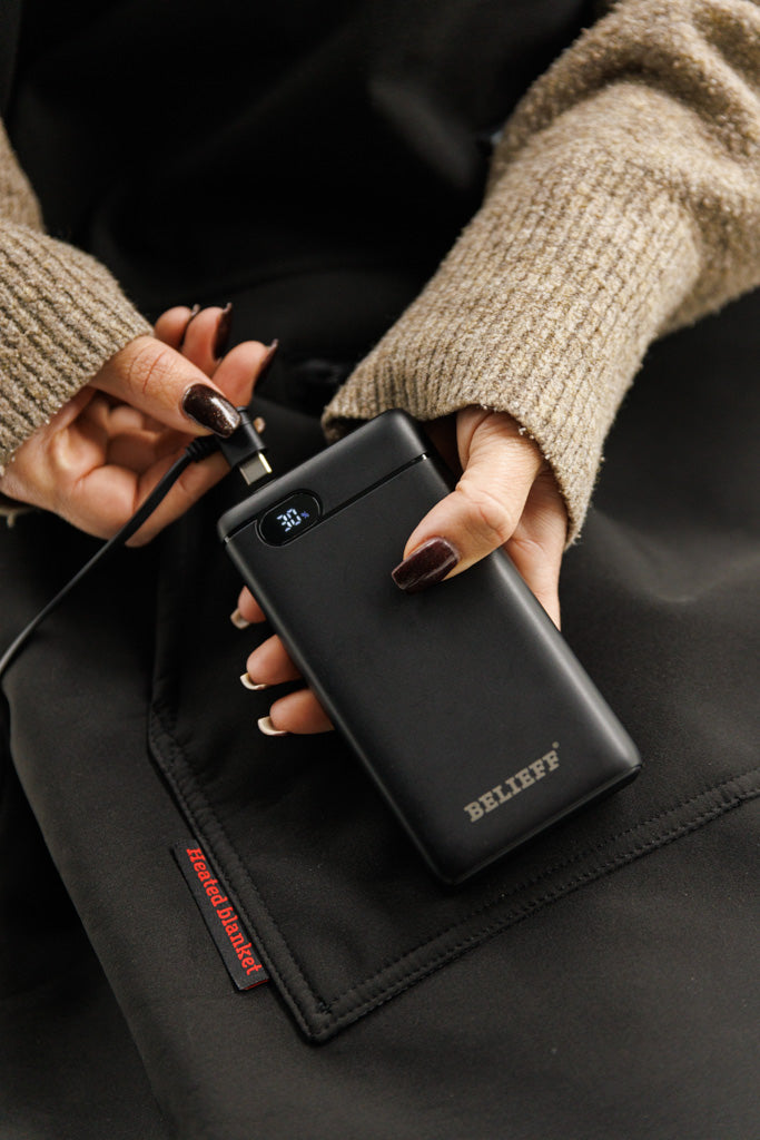 Heated footmuff with power bank